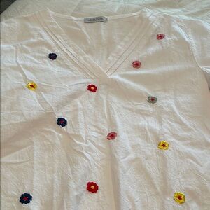 MISSLOOK White V-Neck Blouse with Embellished Design